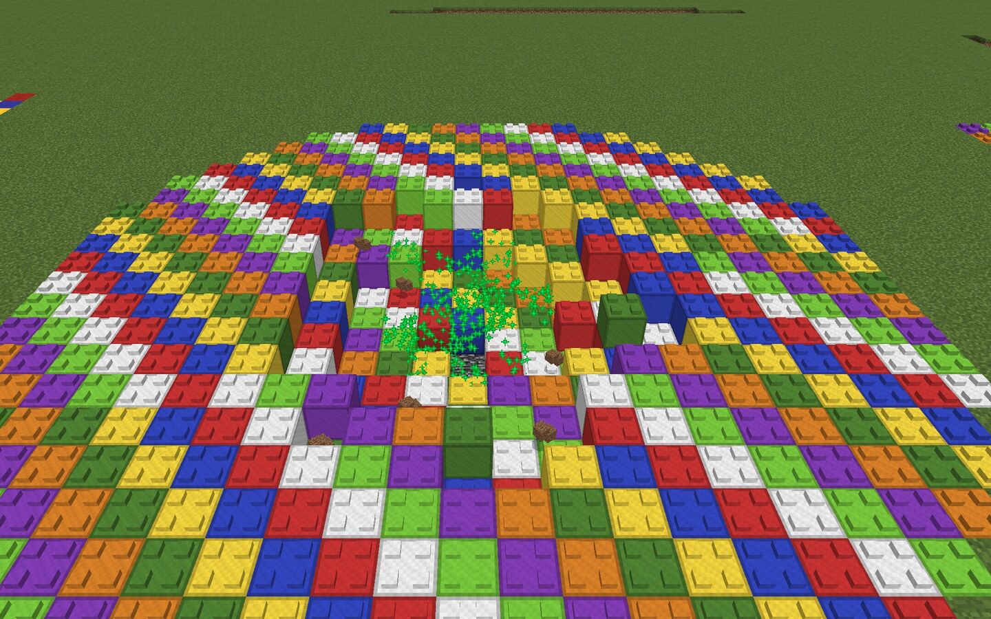 Lego TNT: 20 blok yarıçapındaki çimen renkli Lego tuğlalarına dönmüş, ortada krater ve yeşil parıltı